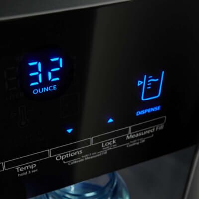 Close-up of a refrigerator water dispenser using the Measured Fill option