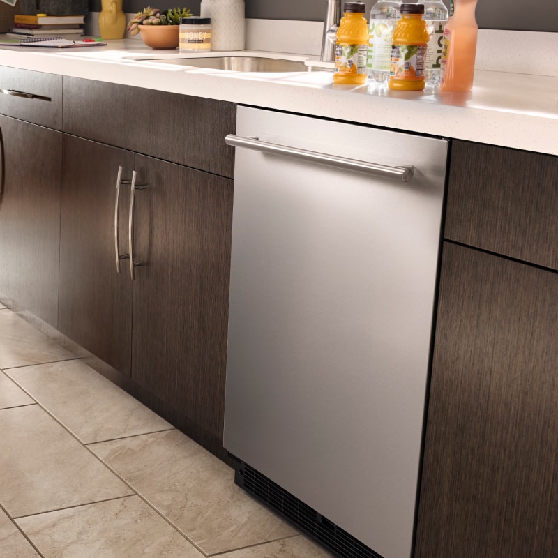 An undercounter fridge installed in a kitchen