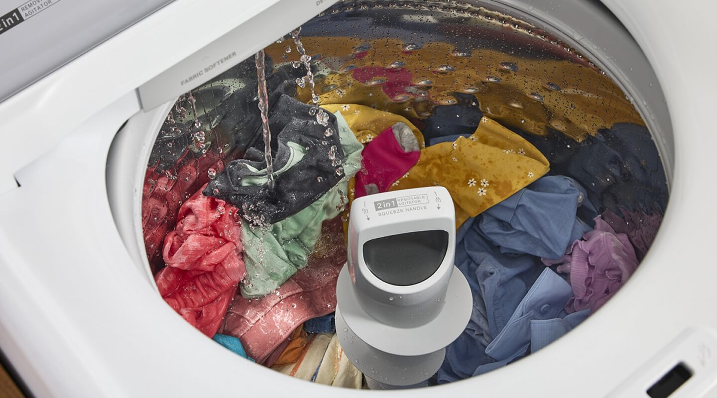 Water running into a Whirlpool® Washing Machine with a 2-in-1 Removable Agitator Water running into a Whirlpool® Washing Machine with a 2-in-1 Removable Agitator