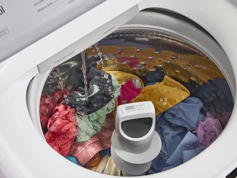 Water running into a Whirlpool® Washing Machine with a 2-in-1 Removable Agitator Water running into a Whirlpool® Washing Machine with a 2-in-1 Removable Agitator