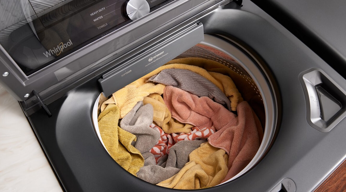 Overhead view of a load of rags and towels in a washing machine Overhead view of a load of rags and towels in a washing machine
