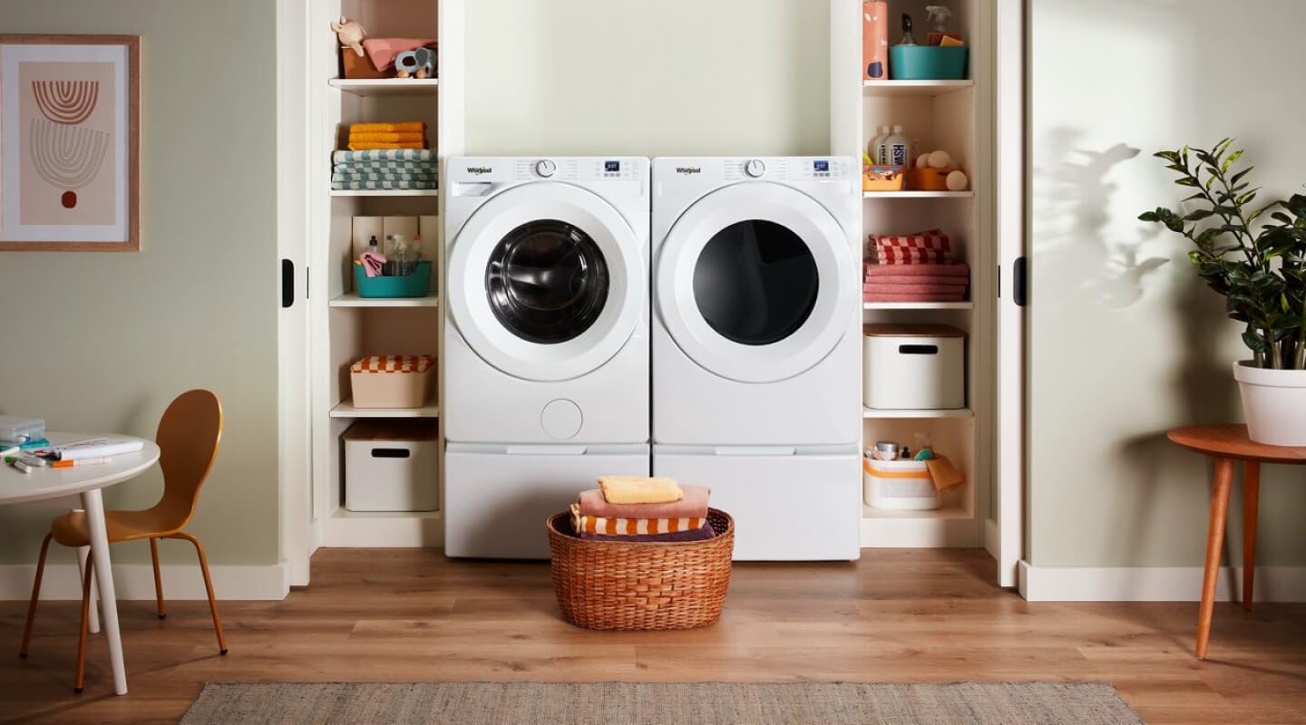 Whirlpool® Front Load Washer and Dryer in a modern laundry room