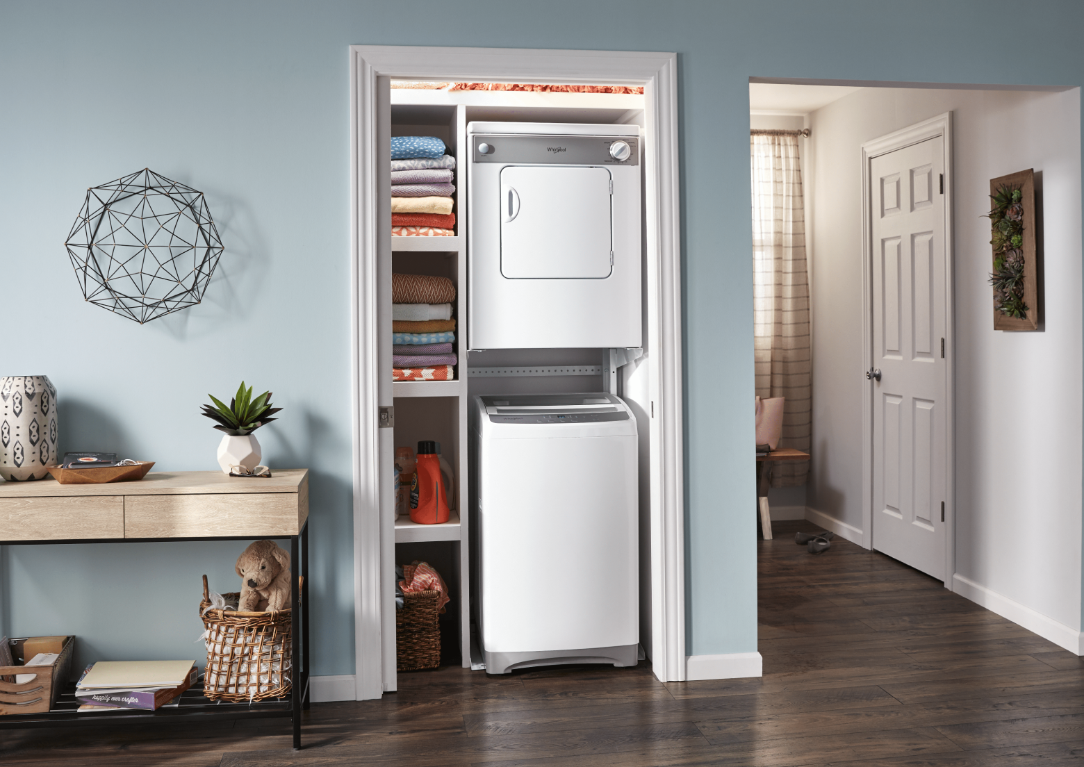 Stacked washer and dryer in a closet