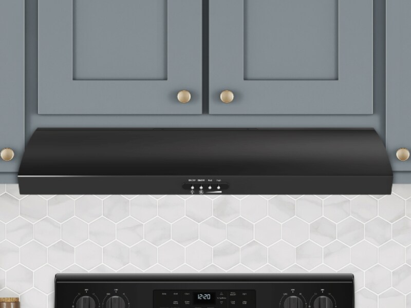 Black undercabinet hood under blue shaker cabinets Black undercabinet hood under blue shaker cabinets
