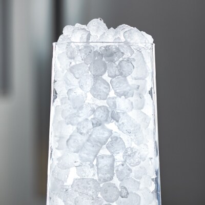 Tall glass filled with nugget ice