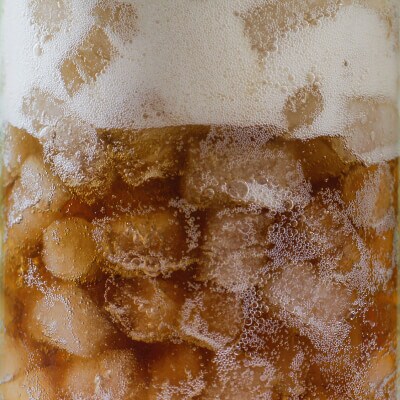 Glass full of soda and nugget ice