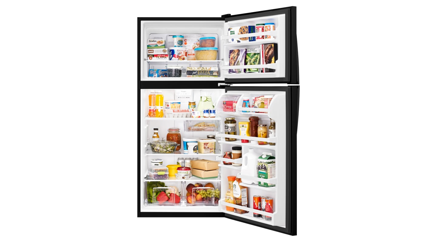 Open top-freezer refrigerator with food inside Open top-freezer refrigerator with food inside