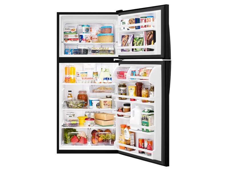 Open top-freezer refrigerator with food inside Open top-freezer refrigerator with food inside