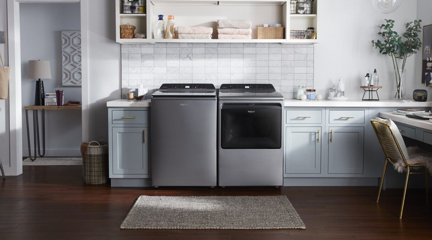 A Whirlpool® washer and dryer pair in a laundry room