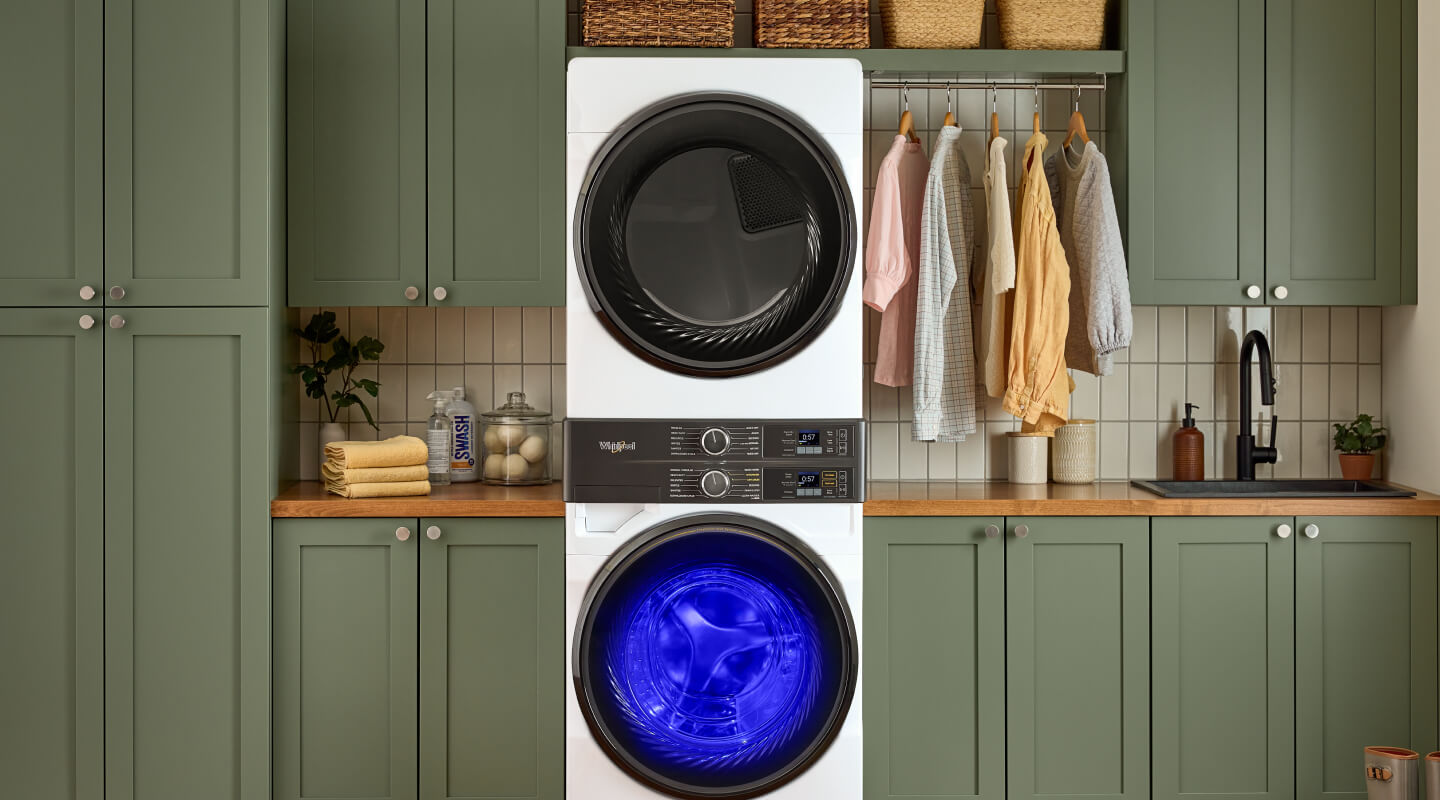 Whirlpool® Front Load Laundry Tower with UV Clean Technology shining in the washer