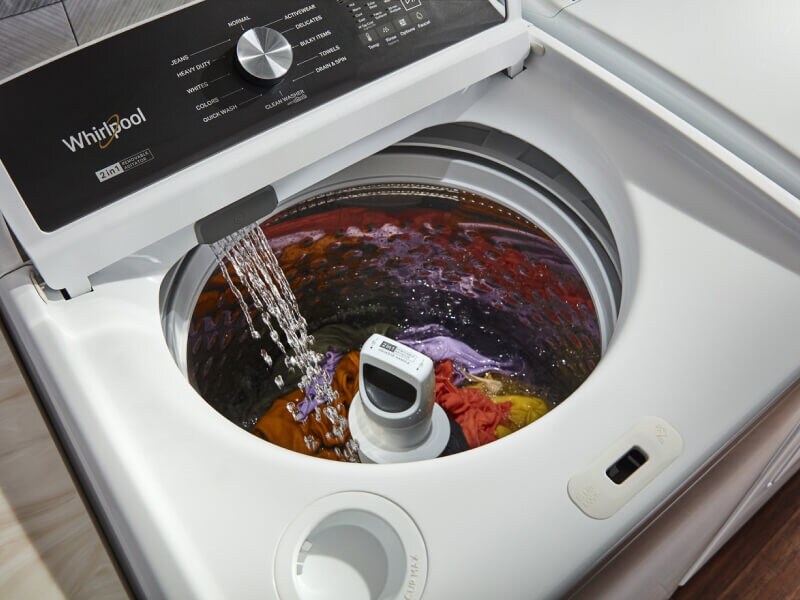 Top load washer filled with laundry