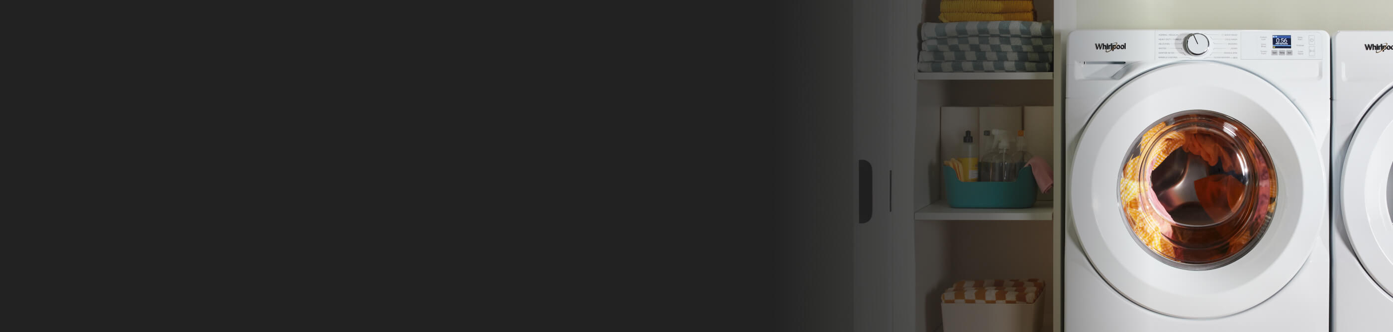 White front load washer during a wash cycle