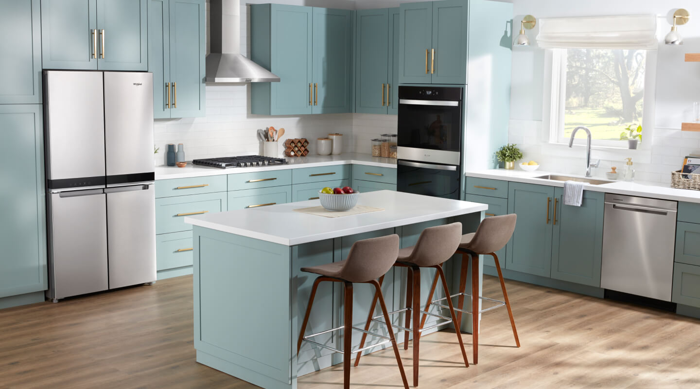 4-door refrigerator in a blue kitchen