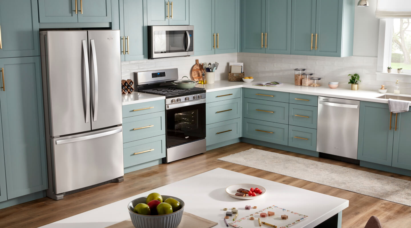 Teal and white kitchen island with three stools Teal and white kitchen island with three stools