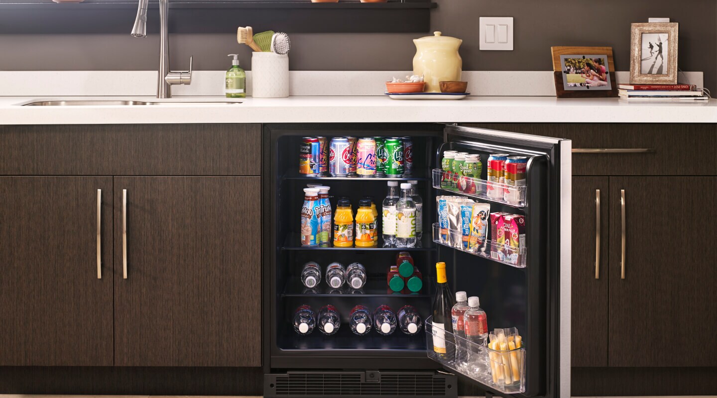 Whirlpool® beverage center filled with cans and bottles Whirlpool® beverage center filled with cans and bottles