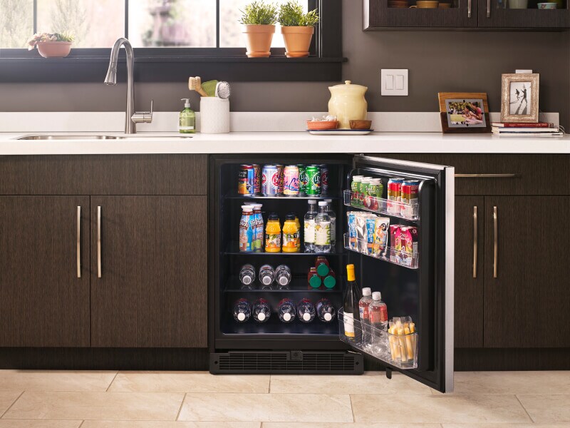 Whirlpool® beverage center filled with cans and bottles Whirlpool® beverage center filled with cans and bottles