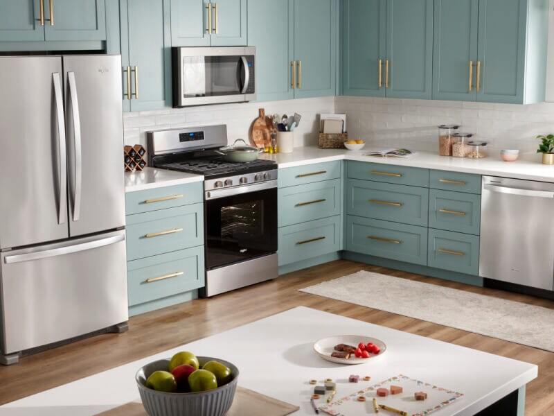 Teal and white kitchen island with three stools Teal and white kitchen island with three stools