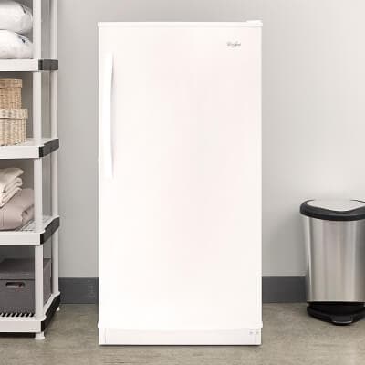A Whirlpool® Freezer in a garage