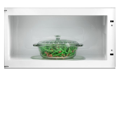 A container of green beans inside a microwave.