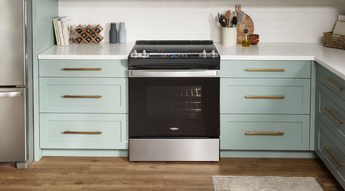 Whirlpool electric range in a light blue kitchen Whirlpool® electric range in a light blue kitchen