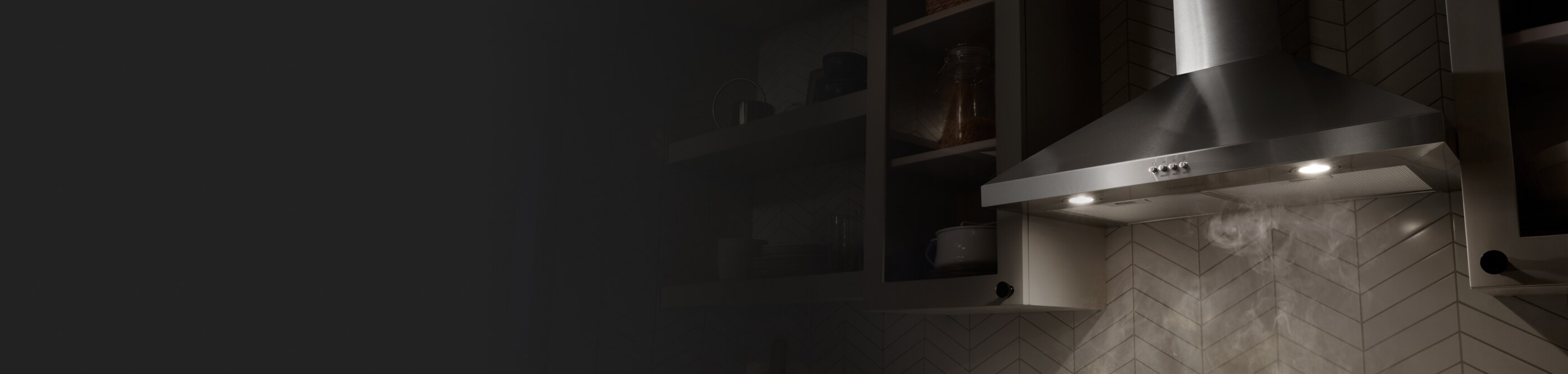 A range hood collecting the steam from various dishes cooking on a stovetop