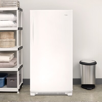 Upright freezer in a garage