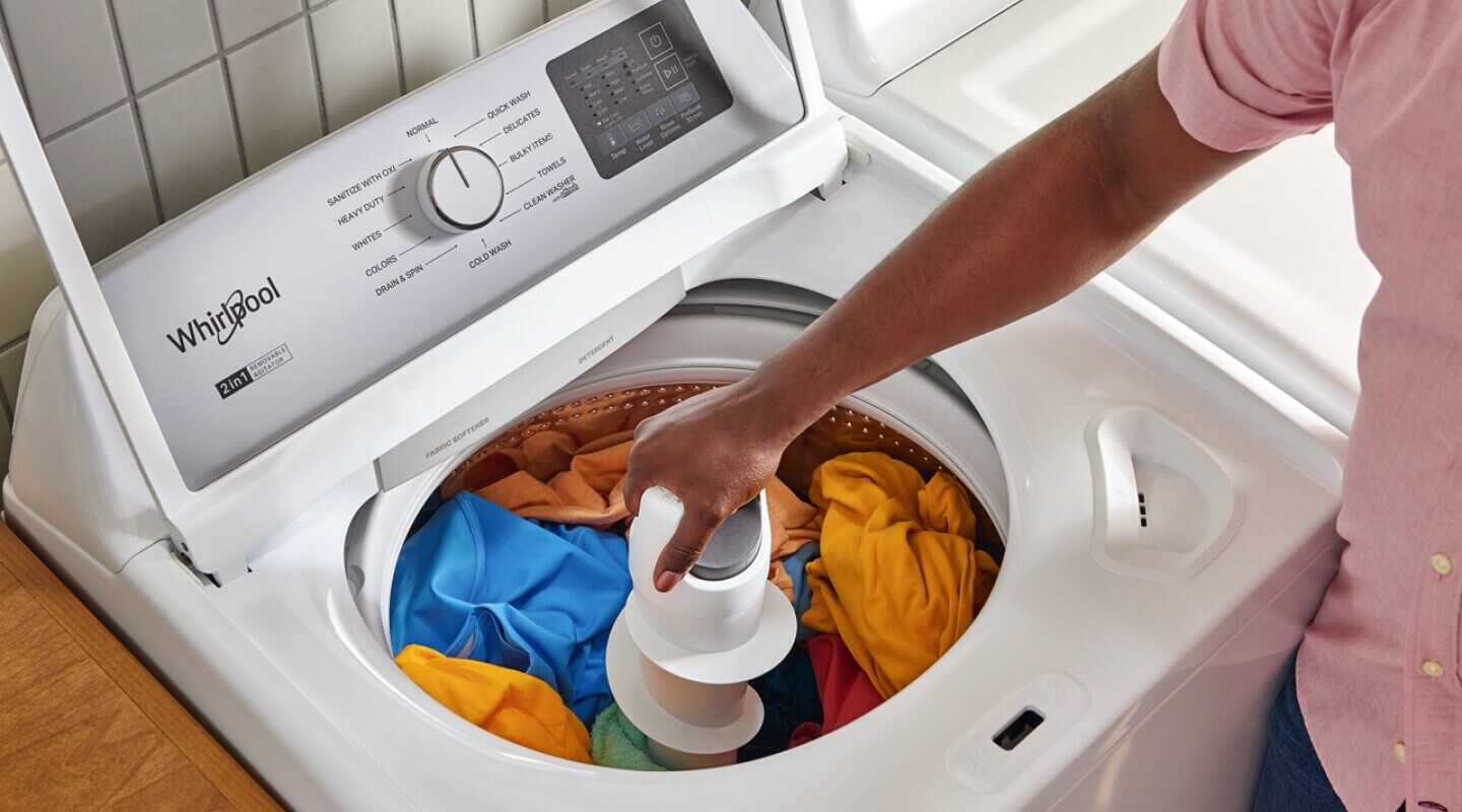 An open top load Whirlpool® Washer with a removable agitator
