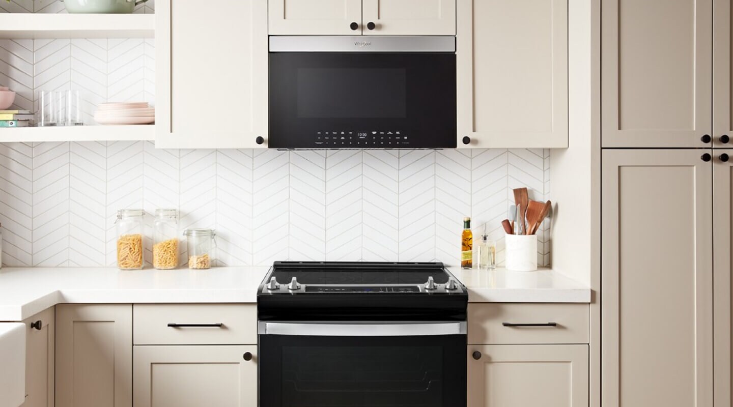 Whirlpool® Microwave and Range in an almond colored kitchen