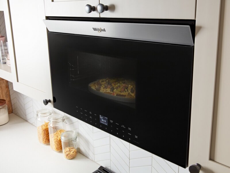 Whirlpool® Microwave with food cooking inside