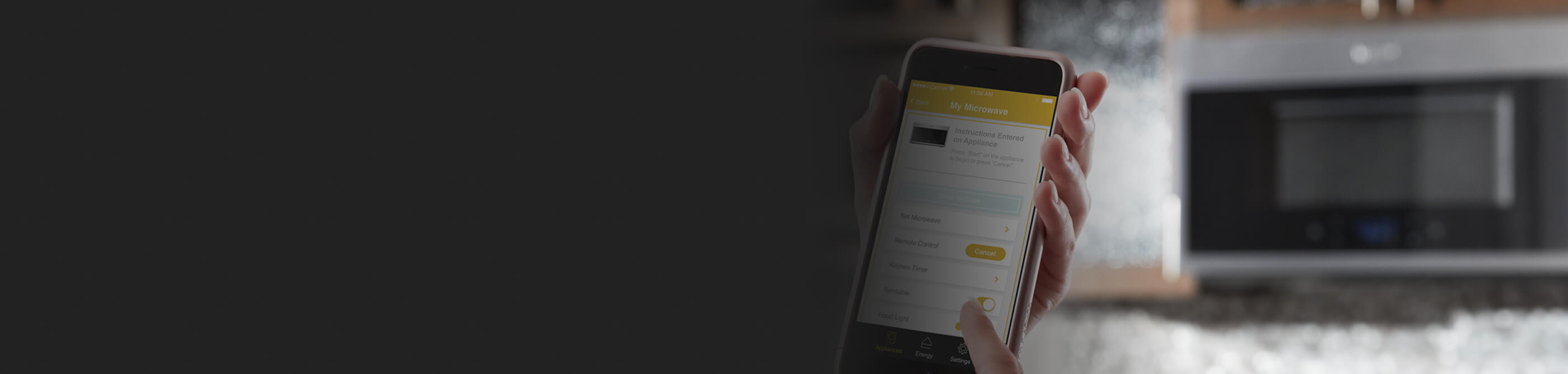 Person holding a phone and using the Whirlpool® App