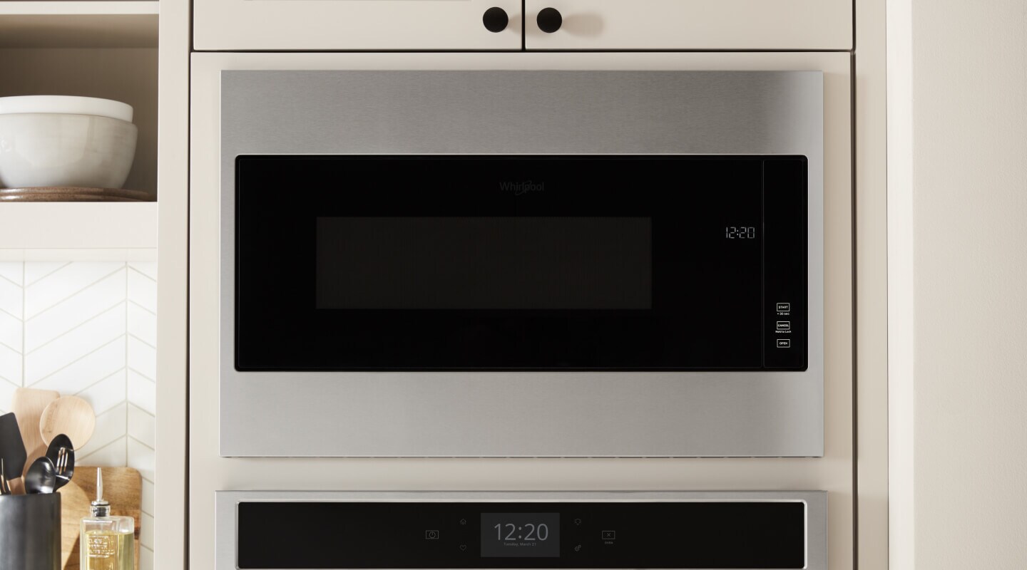 Stainless steel microwave built in to cabinetry Stainless steel microwave built in to cabinetry