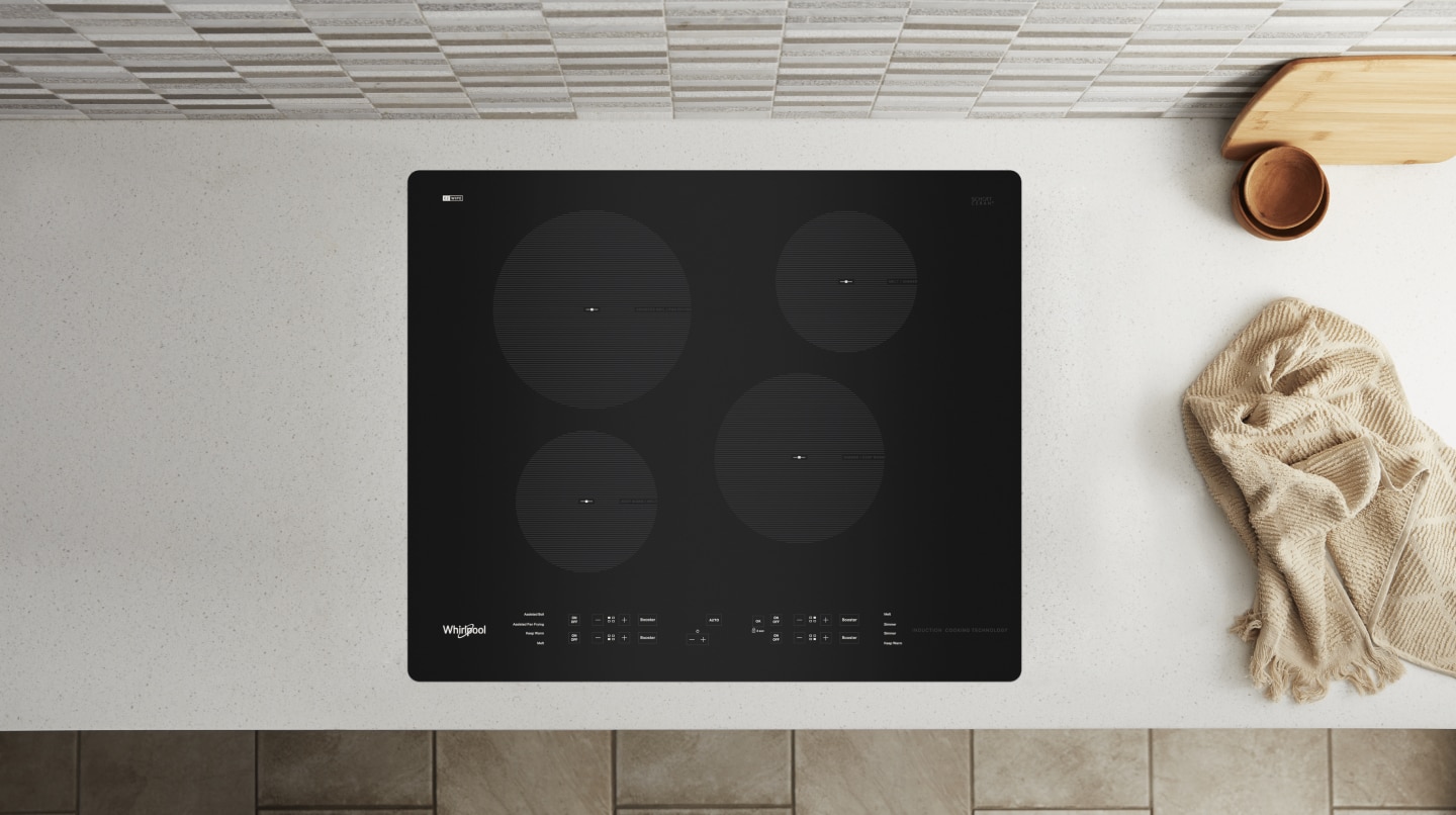 An overhead view of a Whirlpool® Induction Cooktop build into a countertop An overhead view of a Whirlpool® Induction Cooktop build into a countertop