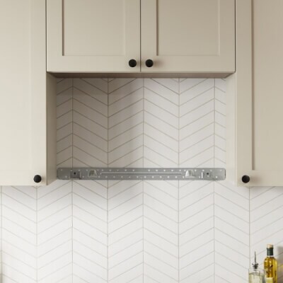 A blank space on a wall where a microwave could be installed