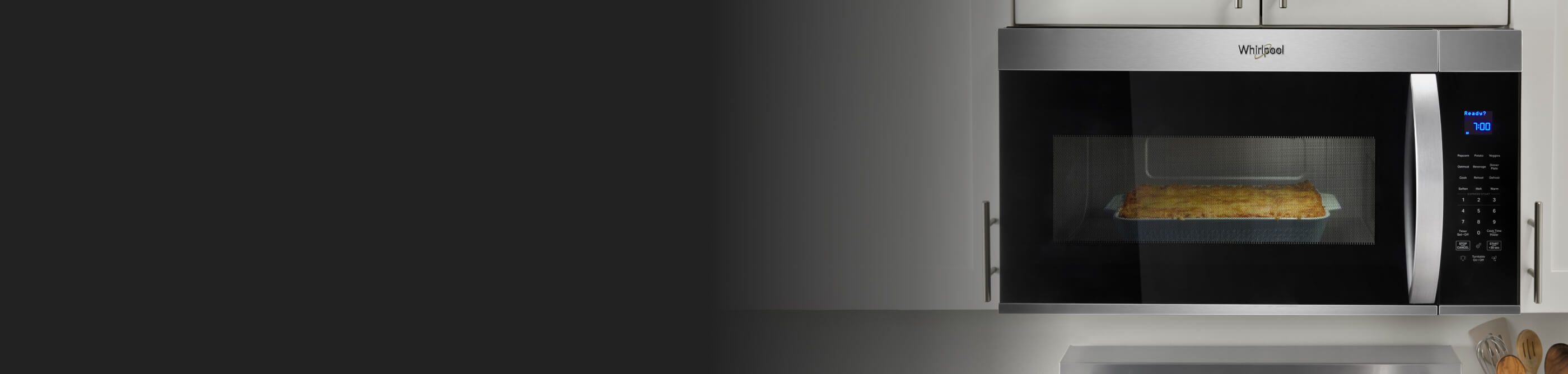 A Whirlpool® Microwave with a casserole inside