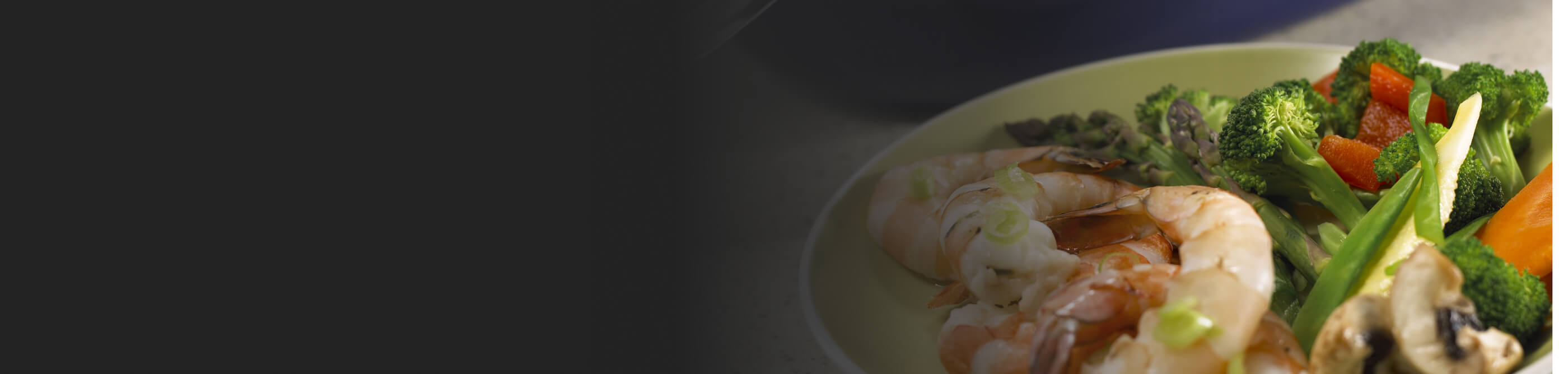 A vegetable and shrimp dish on a plate