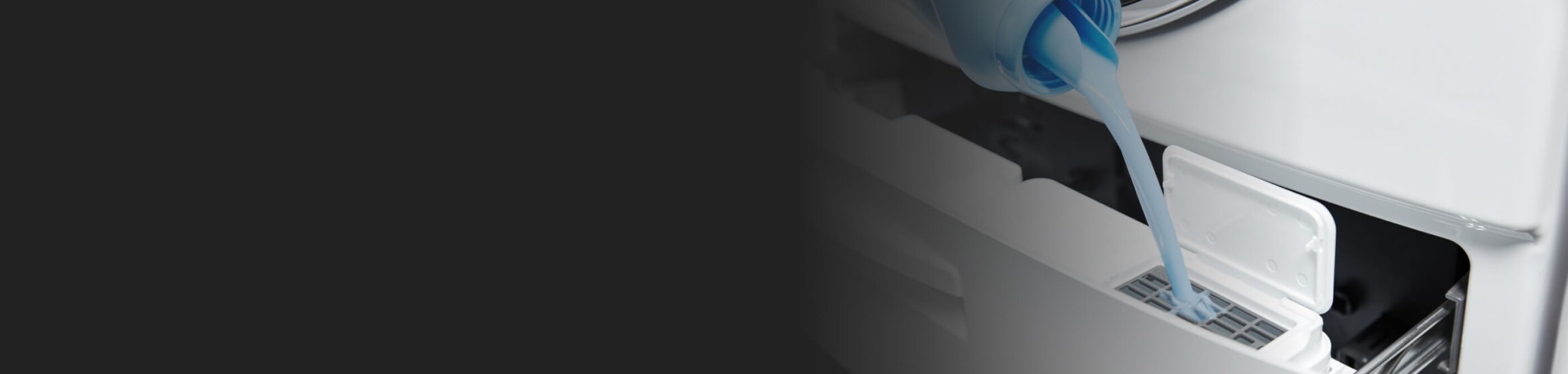 Liquid fabric softener being added to a washing machine dispenser 