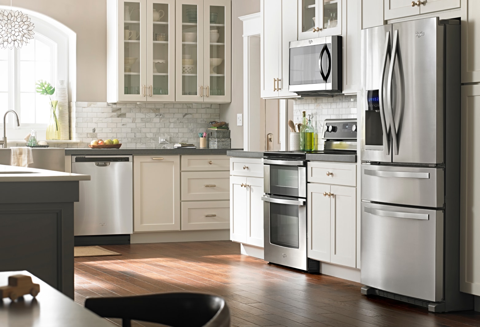 Whirlpool® stainless steel French door refrigerator in open kitchen Whirlpool® stainless steel French door refrigerator in open kitchen