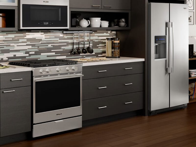 A Whirlpool® oven in a modern kitchen. A Whirlpool® oven in a modern kitchen.