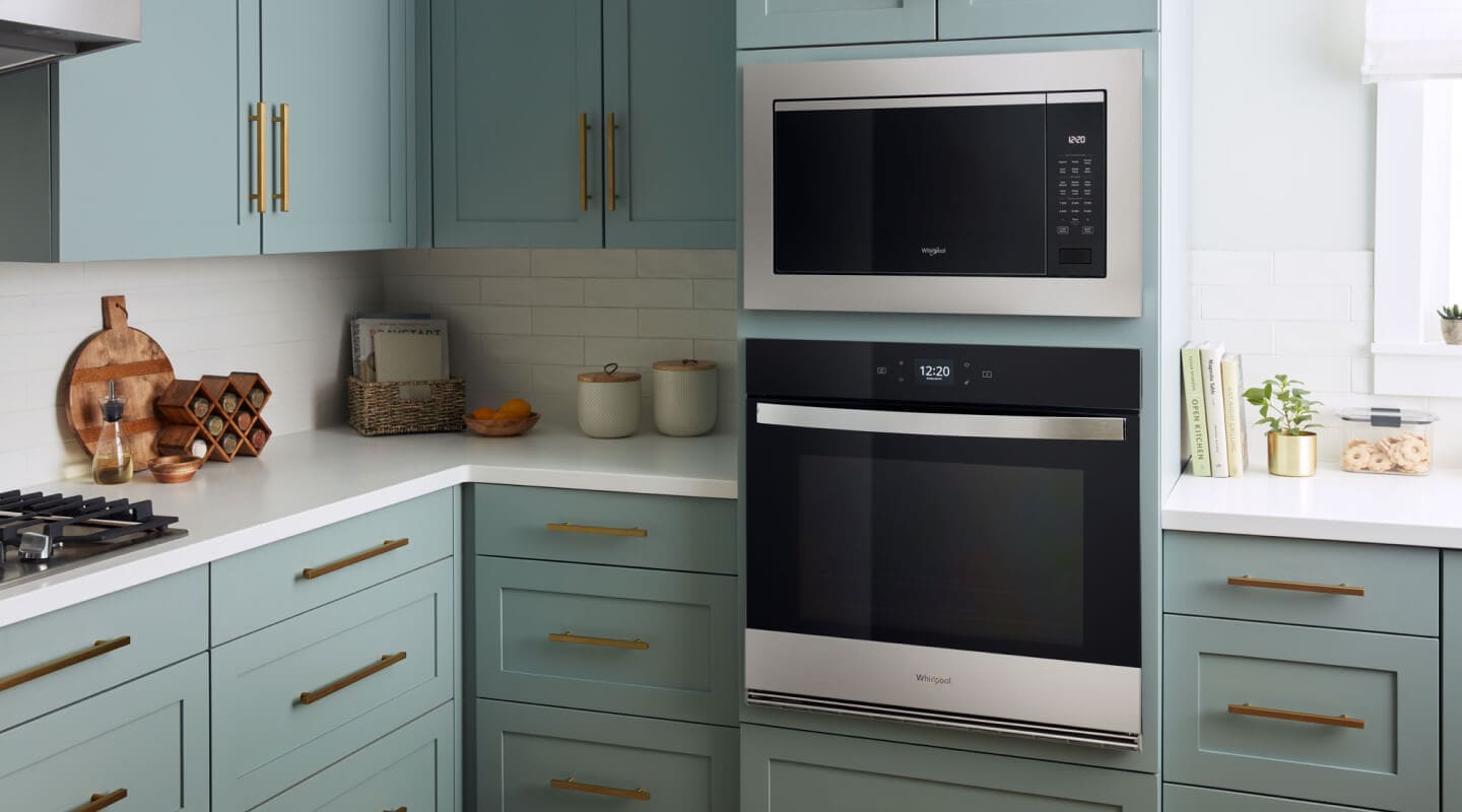 A kitchen with a built-in microwave above a wall oven A kitchen with a built-in microwave above a wall oven