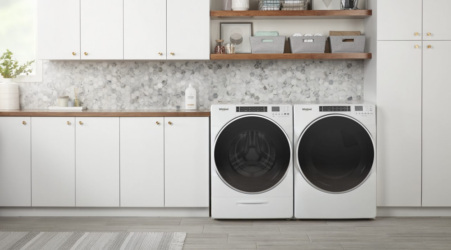 Whirlpool® washer and dryer in a laundry room