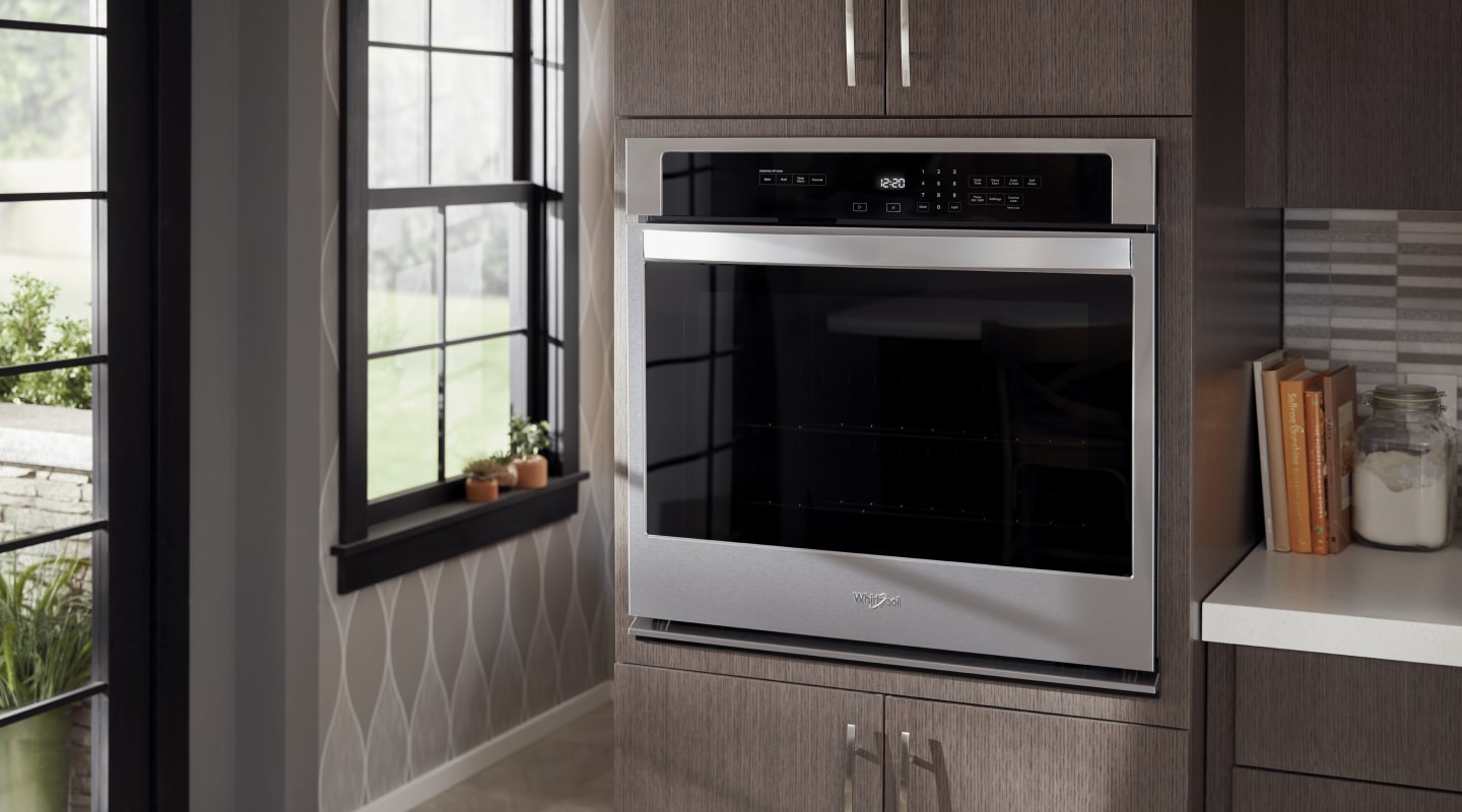 Black and silver Whirlpool oven Black and silver Whirlpool oven