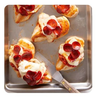 Chicken breasts topped with mozzarella cheese and pepperoni  Chicken breasts topped with mozzarella cheese and pepperoni