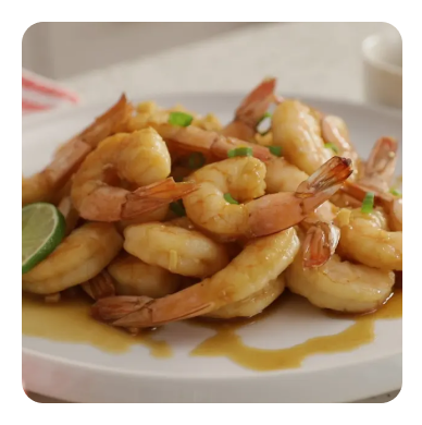 Shrimp with herbs in a light pink dish Shrimp with herbs in a light pink dish