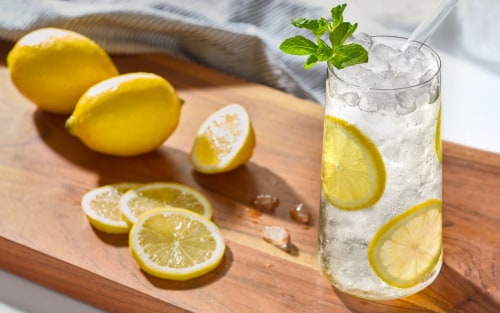 Lemon water in a glass with nugget ice