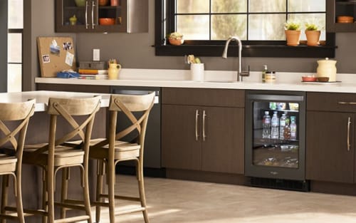 An undercounter refrigerator with beverages inside