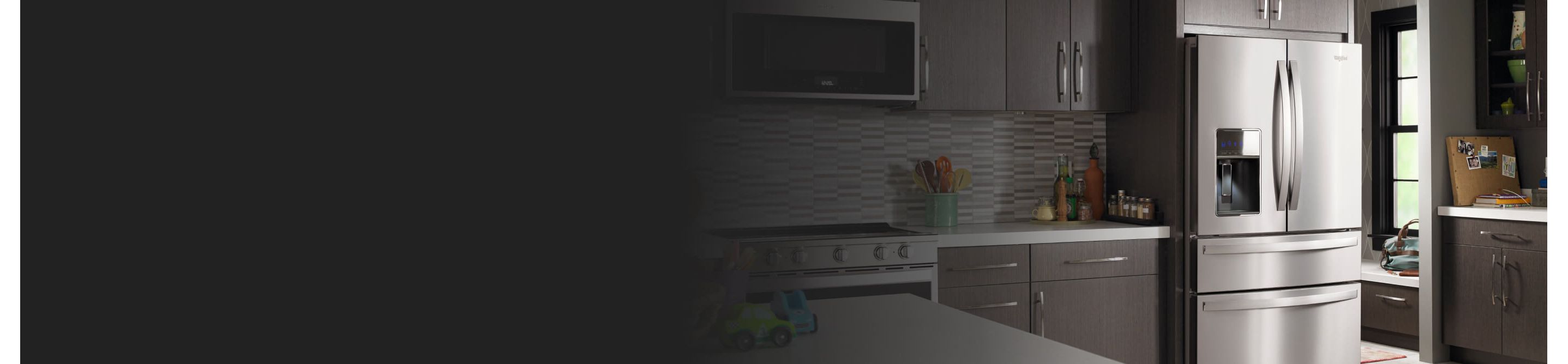 Stainless steel Whirlpool® French Door Refrigerator in brown cabinetry