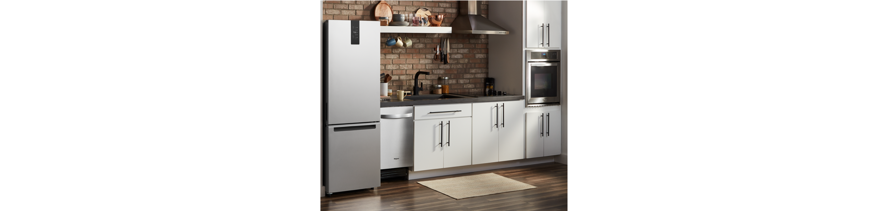 An apartment kitchen full of Whirlpool® Small Space Kitchen Appliances