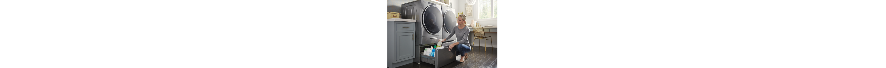 A woman putting away cleaning supplies in a laundry pedestal 