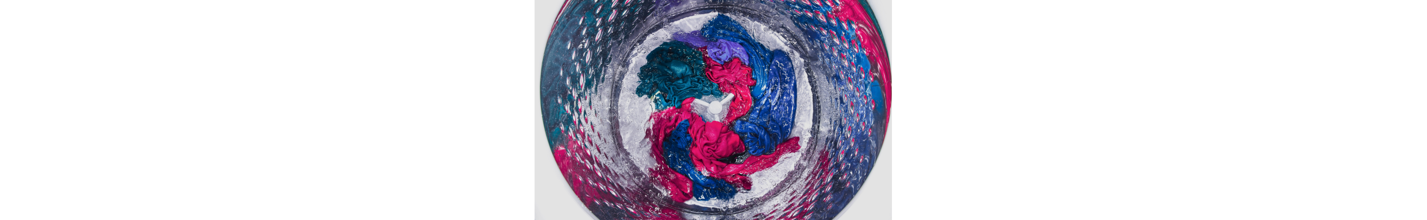 Colorful load of laundry in a washing machine