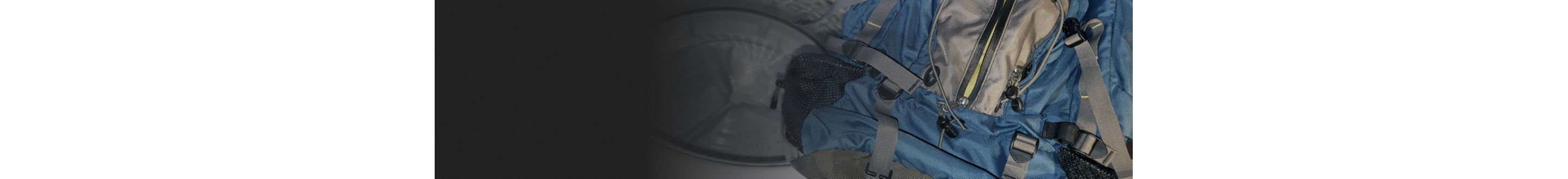 Backpack placed near the interior of a washing machine